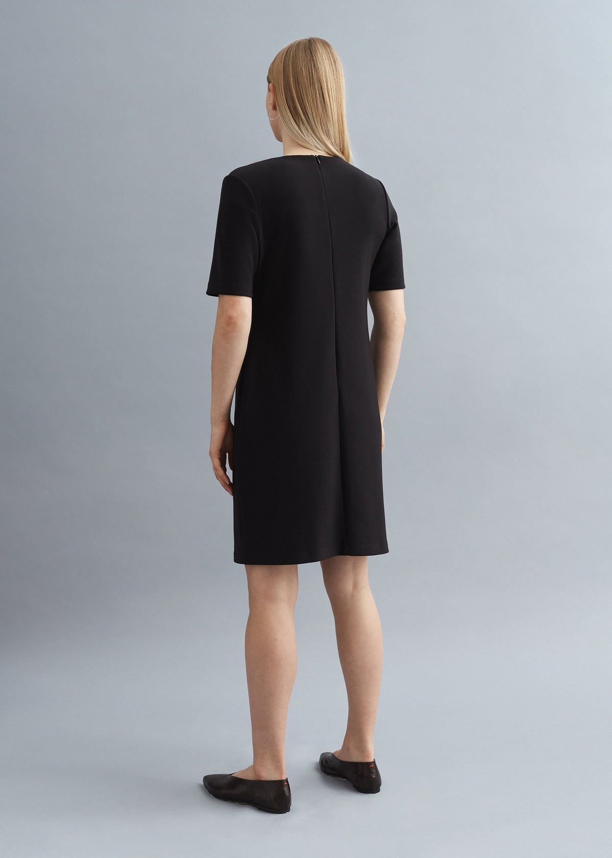 MORELLE. Asymmetric buttoned dress. Black